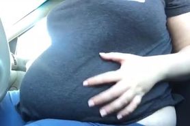 showing belly in car