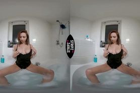 Redhead strips in bathtub
