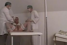 Men dressed as doctors put huge dildo on male patient