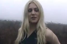 Blond Emma flashes on the hills
