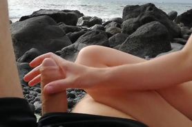 Public sensual handjob at beach – big boobs