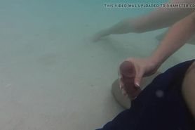 Handjob in the water during the honeymoon