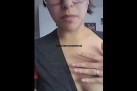 Girl with glasses squeezes milk from her boob for Youtube