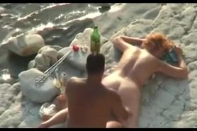Beach spycam catches voyeur couple