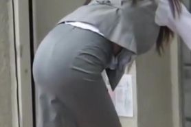 Hot office worker bending over and showing street candid ass