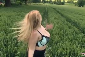 Chubby naked girl in a field