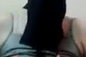 Egyptian Arab girl in a niqab has a big ass. Beautiful MILF on camera