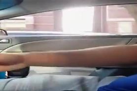 Guy plays with his cock inside car