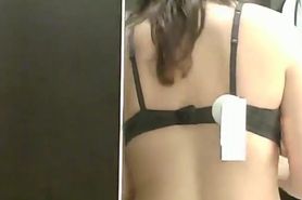 Dressing room hidden cam - Topless brunette with big tits