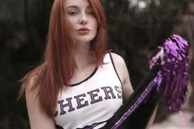 Redheaded Cheerleader Shakes her Ass