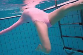 Pink swimsuit girl Liza Bubarek stripping underwater