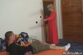 Perverted blonde GILF giving a handjob and a blowjob