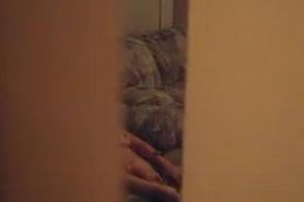 A voyeur masturbation video starring  completely naked girl on the sofa