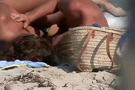 Couple making out on a beach