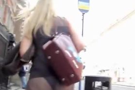 Street candid butt of luxurious blonde in sheer skirt