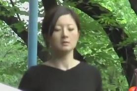 Japanese milf skirt sharked while walking down the stairs