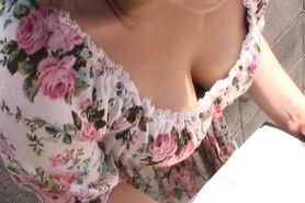Downblouse scene with skinny and cute babe in sexy dress