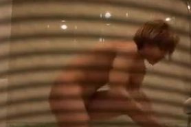 Bubble butt brunette captured on a shower spy cam