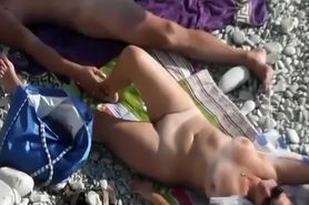 Satisfying beach blowjob spied upon
