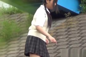 Asian teenagers urinate
