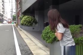 Teenage Asian redhead filmed while peeing on the street