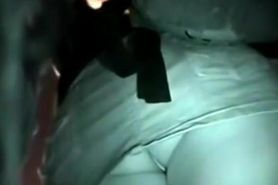 Tight booty is spotted right in the middle of the public bus