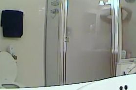 Spy cam shower vid with girl hiding body under towel