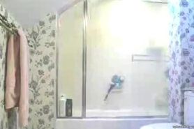 Punk girl getting ready for shower sees hidden cam