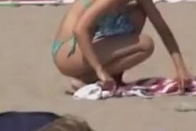 Candid beach girl is playing volley ball in bikini 04w