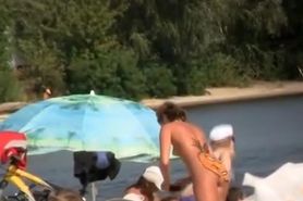 Nudist woman smile on her butt