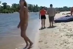 Naked Blonde Girl at the Beach Tanning