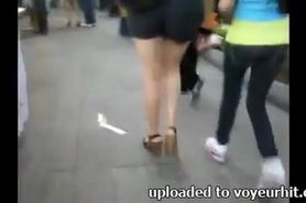 Candid sexy mother mini short and heels