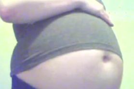 Girl's belly inflates to a large size