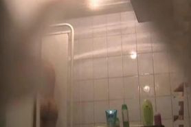 Fem flashes bushy nub and boobs on hidden shower cam