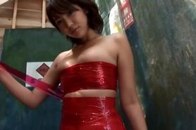 Asian girl in clean red plastic tape