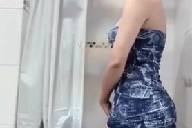 Thai girl wash panties in the shower