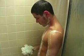 Big strong dick brunette twink wanking it rough in the shower