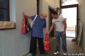 Granny with big tits is happy to take a younger cock