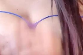 Latina in blue string fucks her pussy with a dildo