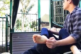 Soles tickling in public