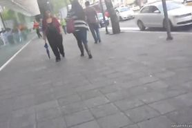 SEXY LADY WALKING IN THE CITY