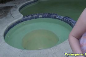 Seductive trans girl masturbates by the pool