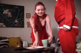 Redheaded girl enjoying Christmas fucking with Santa