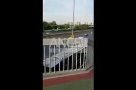 Chinese naked walking on bridge