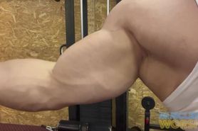 Bodybuilder Showing Off In The Gym