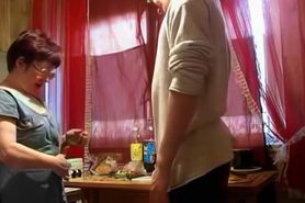 Russian mature mom Nyura with her son in the kitchen