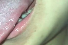 Asian girl brushes her tongue