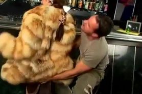 Fur coat girl sex in the bar