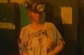 80s model working in a mine