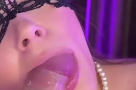 Masked girl sucks a big dick,